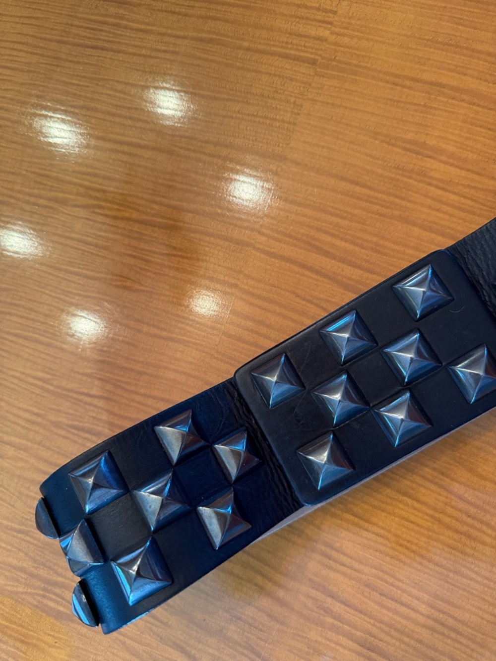 Carries iconic belt
